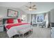 Spacious main bedroom with king bed and sitting area at 6474 S Jericho Cir, Centennial, CO 80016