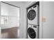 Conveniently located laundry with stacked washer and dryer for efficient space saving at 404 S Jasmine St, Denver, CO 80224