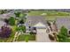Beautiful home with landscaped front yard and a view of the golf course at 5280 Genoa St, Denver, CO 80249