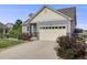 Well-maintained home with stone accents and ample driveway space at 5280 Genoa St, Denver, CO 80249