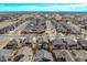 Overhead view showcases a residential area with tree-lined streets and neatly arranged homes at 23941 E Whitaker Dr, Aurora, CO 80016