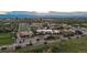 Panoramic aerial view showcasing a sprawling campus with athletic fields and city views at 5227 S Geneva St, Englewood, CO 80111