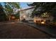 Spacious backyard with a fire pit and outdoor kitchen, perfect for entertaining guests at 5227 S Geneva St, Englewood, CO 80111