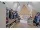 Organized walk-in closet with ample storage space and natural light at 5227 S Geneva St, Englewood, CO 80111