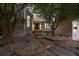 Charming home with manicured landscaping, and walkway leading to the front entrance at 5227 S Geneva St, Englewood, CO 80111