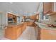 Open kitchen featuring granite countertops, and modern stainless steel appliances at 5227 S Geneva St, Englewood, CO 80111