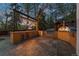Outdoor kitchen featuring a built-in grill, refrigeration, pizza oven, and bar at 5227 S Geneva St, Englewood, CO 80111