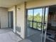 A spacious balcony with sliding glass doors offers serene views at 13601 E Marina Dr # 510, Aurora, CO 80014