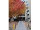 Building entrance with beautiful fall foliage and easy access walkway at 13601 E Marina Dr # 510, Aurora, CO 80014