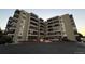 A low angle exterior view of a multi-story residential building at 13601 E Marina Dr # 510, Aurora, CO 80014