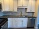 Updated kitchen featuring stainless steel appliances and white cabinets at 13601 E Marina Dr # 510, Aurora, CO 80014