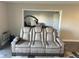 Spacious living room features a comfortable sofa and ample natural light at 13601 E Marina Dr # 510, Aurora, CO 80014