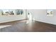 Bright bedroom with wood floors, large windows, and ample natural light creating a welcoming atmosphere at 13765 Emerald Lake St, Parker, CO 80138