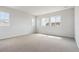 Expansive bedroom with multiple windows offering plenty of natural light at 13765 Emerald Lake St, Parker, CO 80138