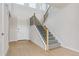 Welcoming entryway with staircase and hardwood floors at 13765 Emerald Lake St, Parker, CO 80138