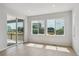 Bright and airy living room with large windows providing abundant natural light and backyard views at 13765 Emerald Lake St, Parker, CO 80138