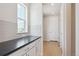 Well-organized pantry showcasing white cabinetry, and plenty of storage space at 13765 Emerald Lake St, Parker, CO 80138