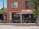 Inviting ice cream shop storefront featuring large windows, seating, and a welcoming atmosphere at 5469 S Curtice St # E, Littleton, CO 80120