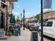 Charming street with outdoor dining, awnings, and local businesses, creating a vibrant atmosphere at 5469 S Curtice St # E, Littleton, CO 80120