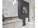 Stylish bathroom features modern fixtures, sleek vanity, and elegant decorative accents at 1750 Wewatta St # 1304, Denver, CO 80202