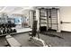 Modern gym with weights, workout equipment, and mirrors, designed for a comprehensive fitness experience at 1750 Wewatta St # 1304, Denver, CO 80202