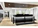 Modern lobby area features a sleek reception desk and stylish wood-slatted ceiling at 1750 Wewatta St # 1304, Denver, CO 80202