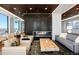 Modern and inviting lounge area with a fireplace and plenty of comfortable seating options at 1750 Wewatta St # 1304, Denver, CO 80202