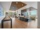Spacious resident lounge featuring a shuffleboard table, comfortable seating, and sleek, modern design at 1750 Wewatta St # 1304, Denver, CO 80202