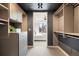 Spacious walk-in closet with custom shelving, drawers, and access to the bedroom at 1750 Wewatta St # 1304, Denver, CO 80202