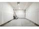 Spacious, unfinished garage ready to be customized with lighting and ample room for parking at 3061 S Glencoe St, Denver, CO 80222