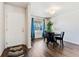 Cozy dining area with hardwood floors, a round table, and plenty of natural light at 47385 Lily Ave, Bennett, CO 80102