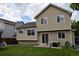 Back of house in backyard with a grill and lots of room to play at 10534 Ursula St, Commerce City, CO 80022
