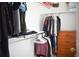 Walk-in closet with ample storage including shelves, rods, and drawers for organization at 10534 Ursula St, Commerce City, CO 80022