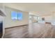 Bright and spacious living room with large windows and an open floor plan at 1290 Loraine N Cir, Lafayette, CO 80026