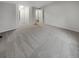 Spacious carpeted bedroom featuring neutral tones and closet space at 5236 S Liverpool Way, Centennial, CO 80015