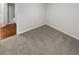 Comfortable bedroom featuring neutral tones and closet space at 5236 S Liverpool Way, Centennial, CO 80015