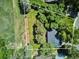 Aerial view of the property showing large private lot with mature trees at 4338 S Alton St, Greenwood Village, CO 80111