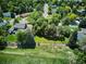 Aerial shot showing property with mature trees and landscaped yard at 4338 S Alton St, Greenwood Village, CO 80111