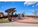 Inviting community area featuring a shaded pavilion, modern art installation, and tranquil landscaping at 4338 S Alton St, Greenwood Village, CO 80111