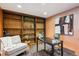 Dedicated home office with built-in shelving and ample desk space for productivity at 4338 S Alton St, Greenwood Village, CO 80111