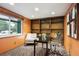 Stylish home office featuring built-in shelving and a comfortable work environment at 4338 S Alton St, Greenwood Village, CO 80111