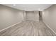 Large finished basement with recessed lighting and durable flooring at 141 S Upham Ct, Lakewood, CO 80226