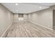 Finished basement with recessed lights and built-in shelving at 141 S Upham Ct, Lakewood, CO 80226