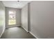 Bedroom featuring a window and neutral carpet at 141 S Upham Ct, Lakewood, CO 80226