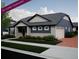 Charming single-story home featuring a two-car garage, well-manicured lawn and attractive landscaping at 21825 E 51St Dr, Aurora, CO 80019