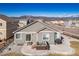 Aerial view of backyard featuring patio, hot tub, and barbecue at 17857 Lapis Ct, Monument, CO 80132