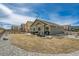 Backyard featuring lawn, patio, and hot tub at 17857 Lapis Ct, Monument, CO 80132