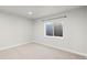 Neutral basement bedroom featuring a window well for added natural light at 17857 Lapis Ct, Monument, CO 80132