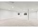 Neutral, spacious finished basement offers versatility for various uses at 17857 Lapis Ct, Monument, CO 80132