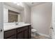 Bathroom with a modern vanity and a full mirror at 17857 Lapis Ct, Monument, CO 80132